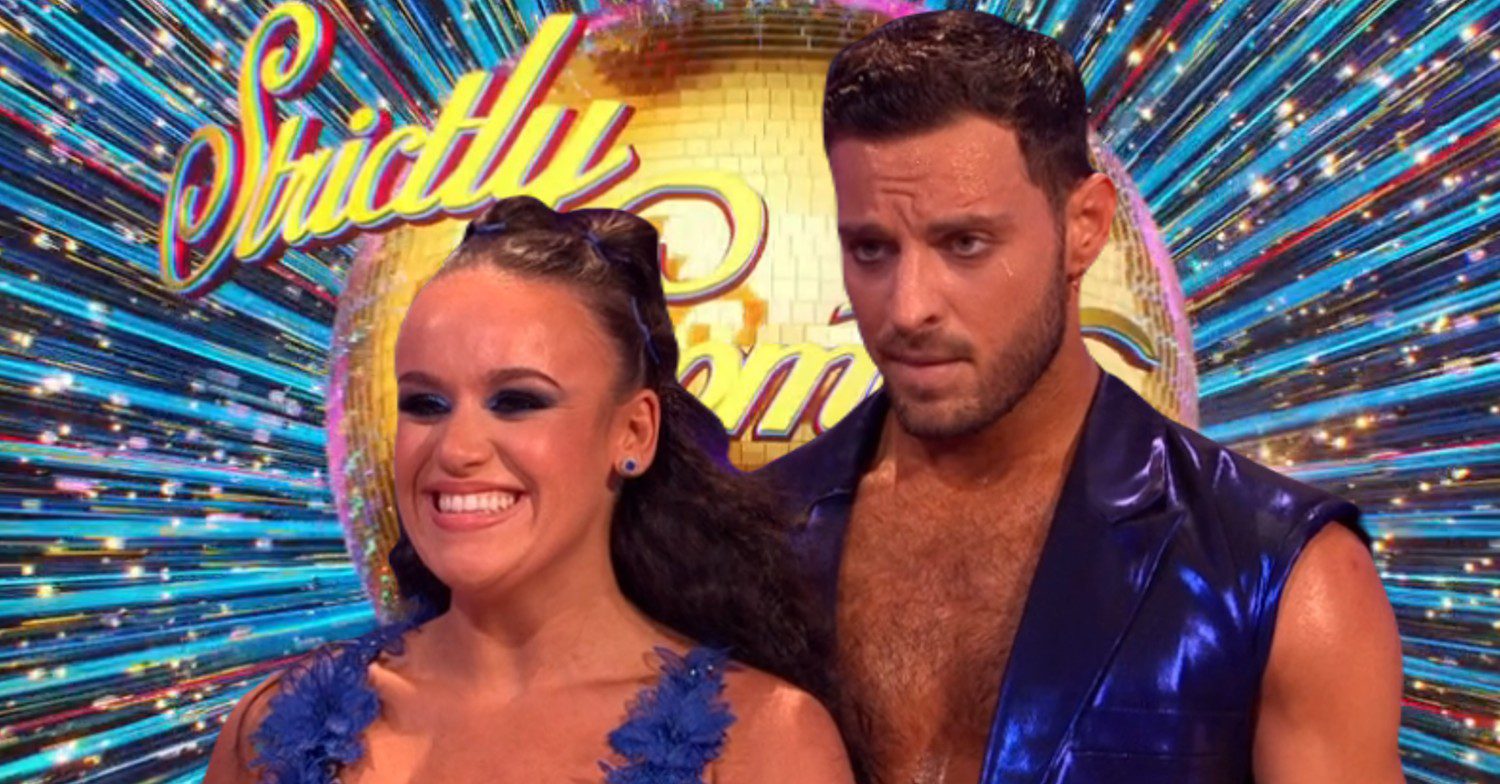 Ellie and Vito in front of Strictly logo