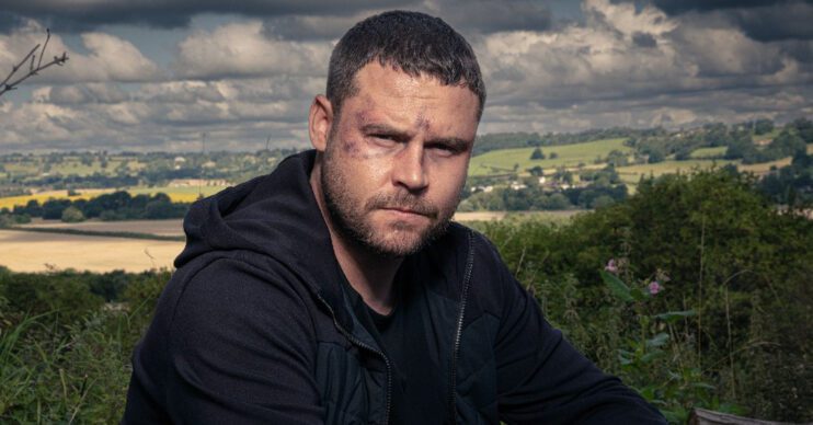 Emmerdale's Aaron is in front of the Dales