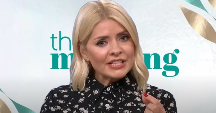 Holly Willoughby looking concerned in front of This Morning title card