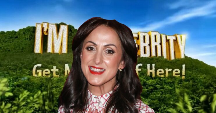 Natalie Cassidy smiles in front of the I'm A Celebrity 2023 logo
