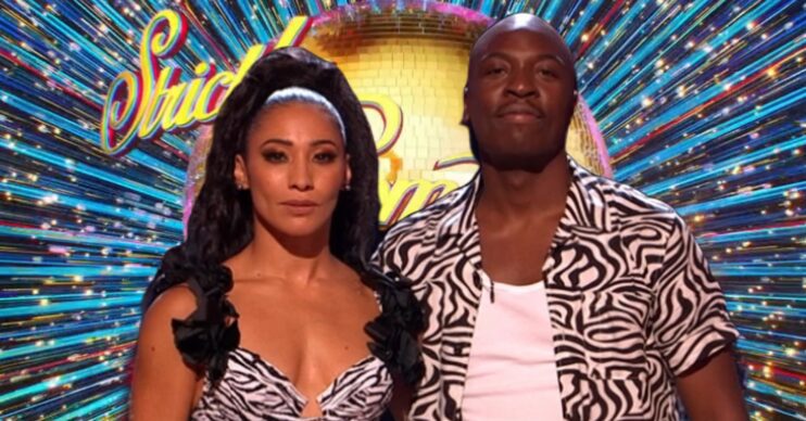 Karen Hauer and Eddie Kadi in front of Strictly logo