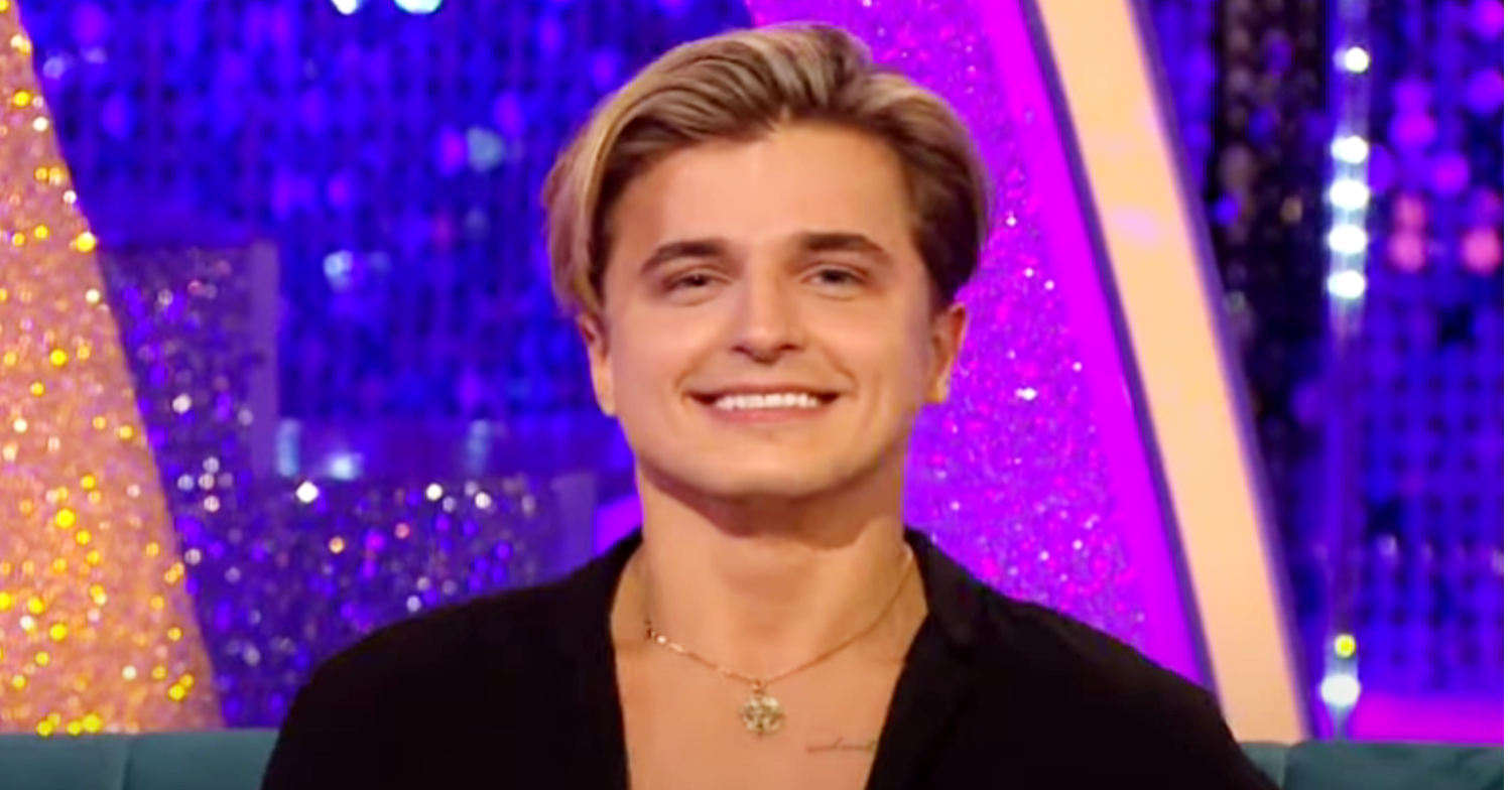 Nikita Kuzmin smiling on It Takes Two (Credit: BBC/YouTube)