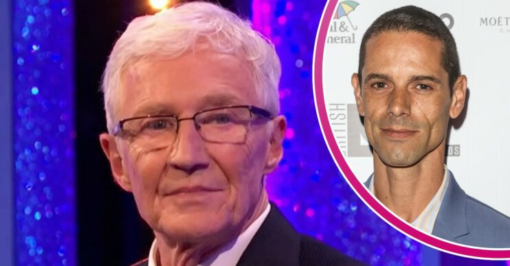 Paul O'Grady looks determined, his husband Andre Portasio looks at the camera