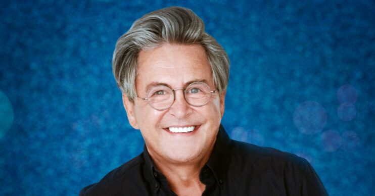 Stephen Lustig-Webb smiles in Dancing On Ice promo shot