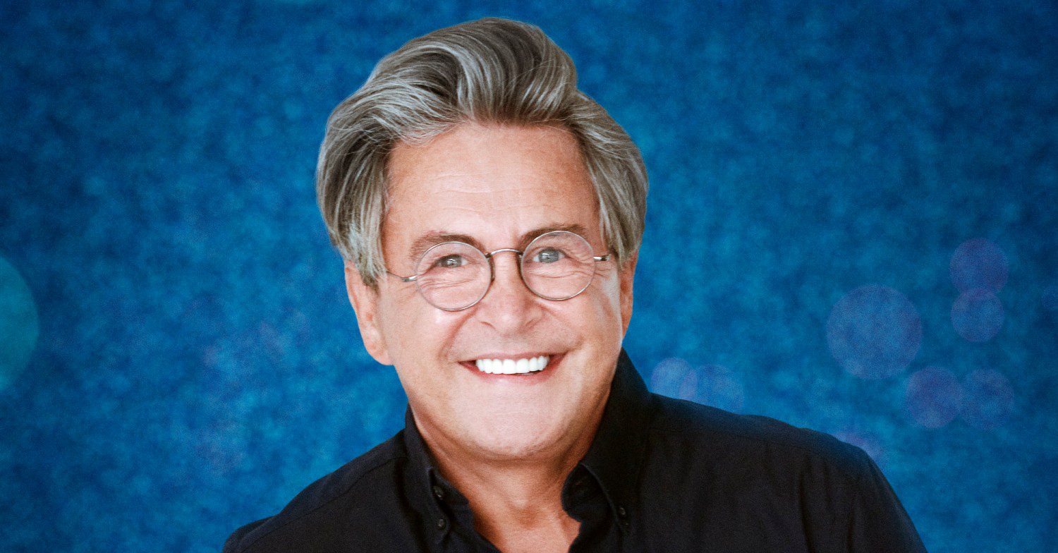 Stephen Lustig-Webb smiles in Dancing On Ice promo shot
