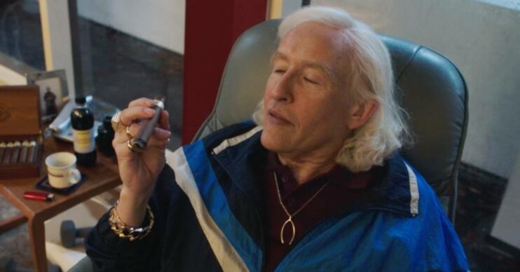 Steve Coogan performs as Jimmy Savile
