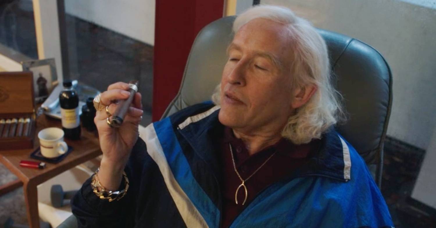Steve Coogan performs as Jimmy Savile