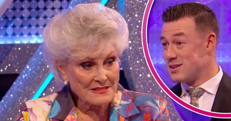 Angela Rippon and Kai Widdrington both look serious on It Takes Two