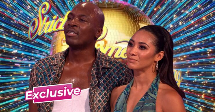 Eddie Kadi and Karen Hauer in front of Strictly logo with ED exclusive badge