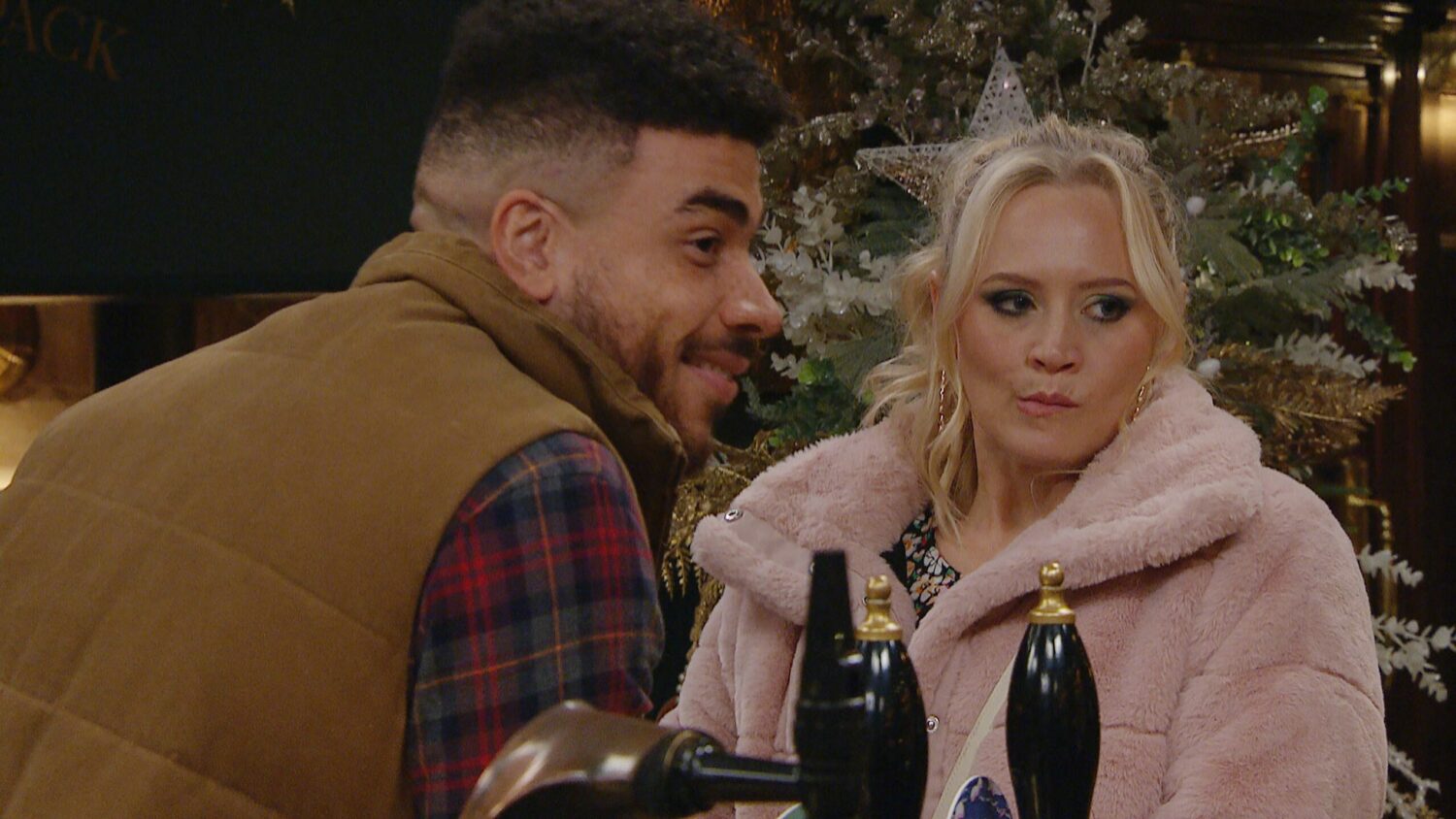 Nate and Tracy looking loved-up in the pub
