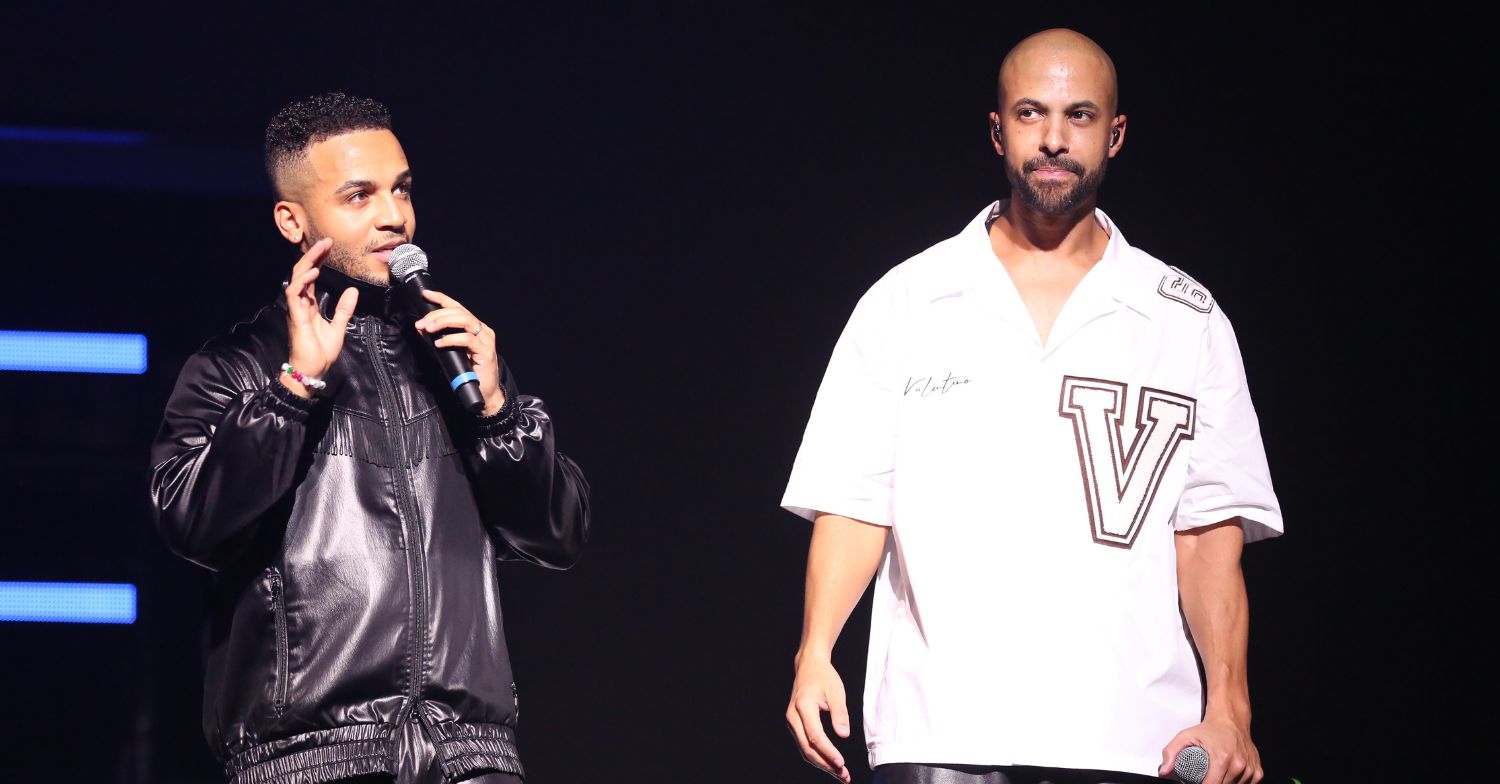 Aston Merrygold and Marvin Humes performing on stage