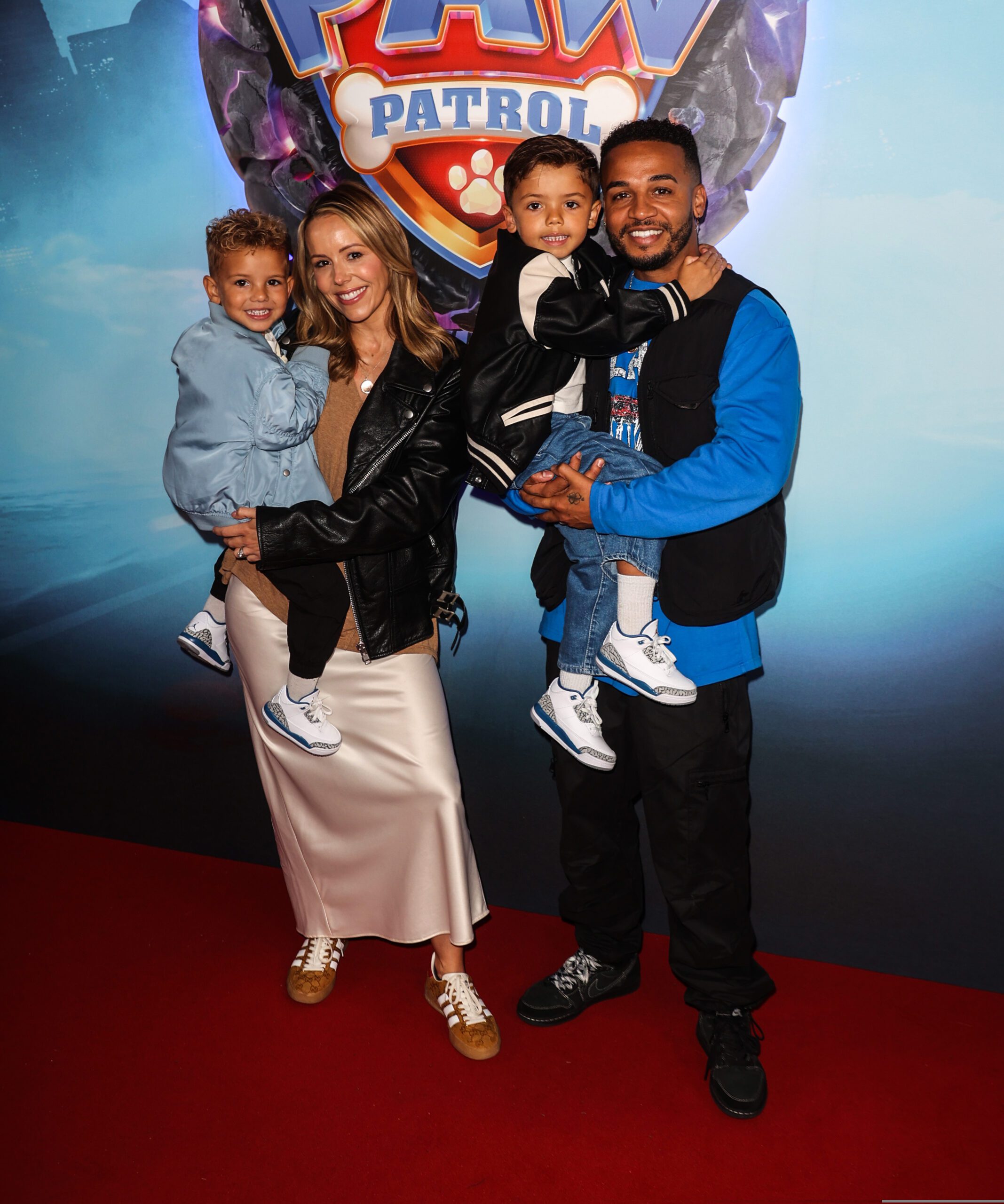 Sarah Lou Richards and Aston Merrygold with their sons at the Paw Patrol premiere