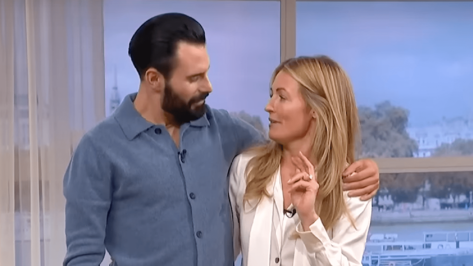 Cat Deeley and Rylan Clark cuddling on This Morning