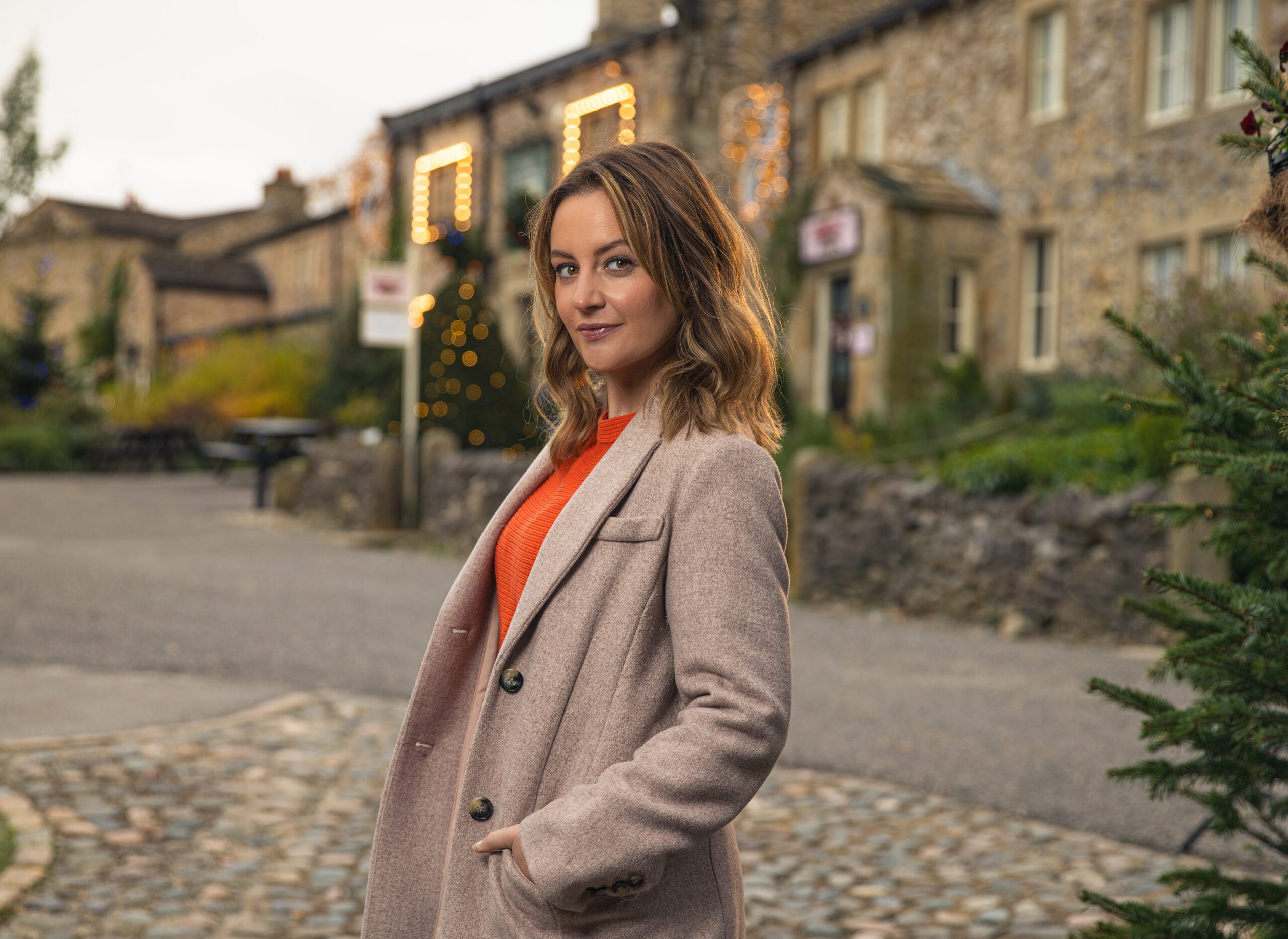 Emmerdale's Paula Lane is standing outside of the Emmerdale village