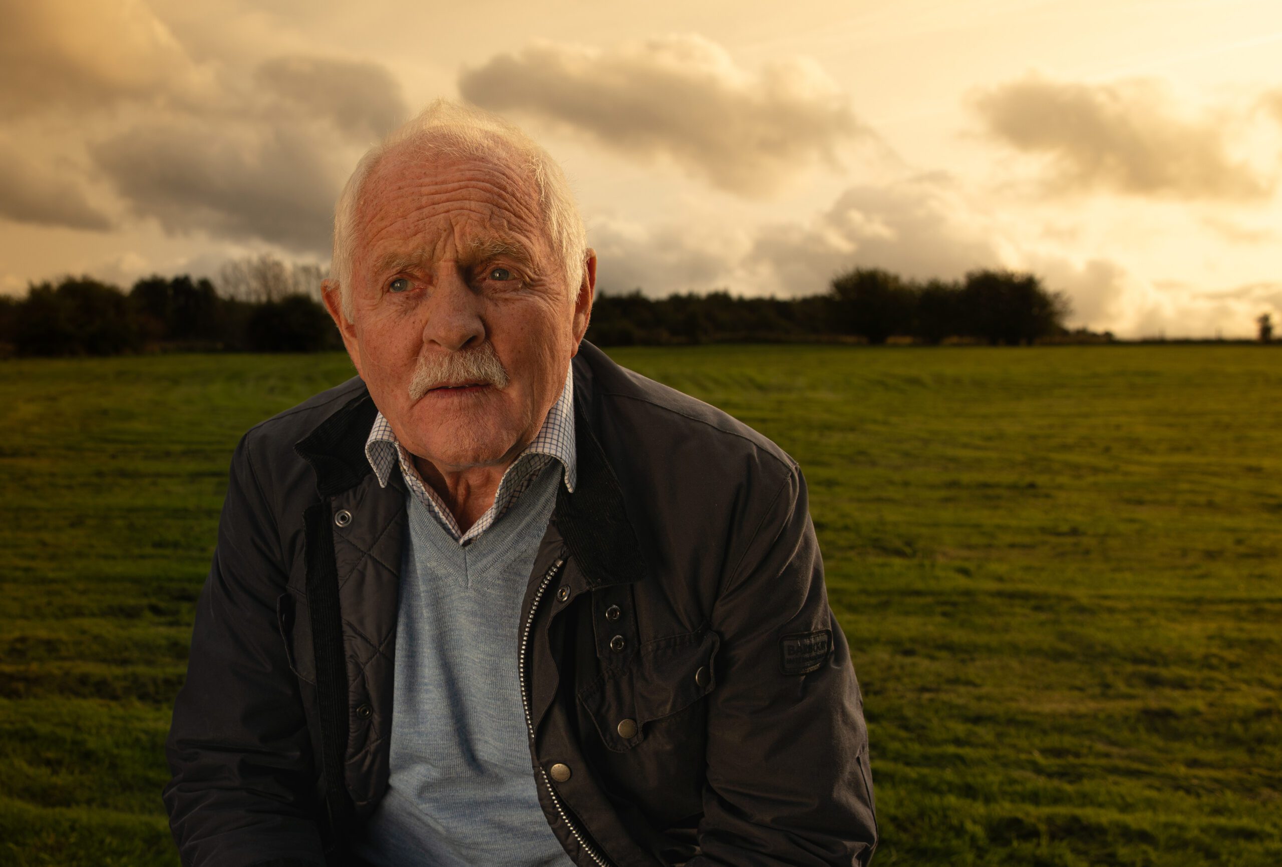 Emmerdale's Eric is sad as he stands in a field alone