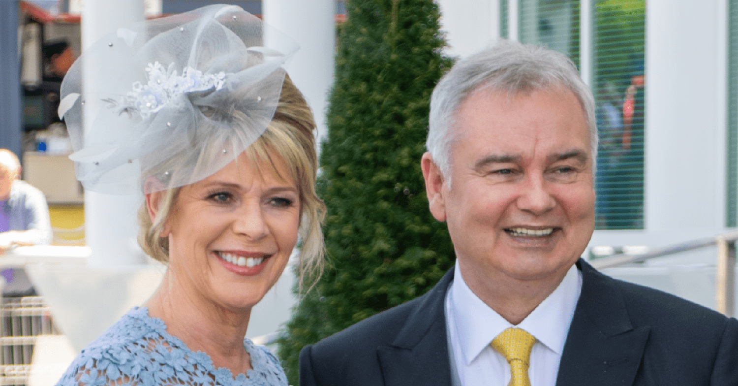 Eamonn Holmes and Ruth Langsford smiling at a posh event
