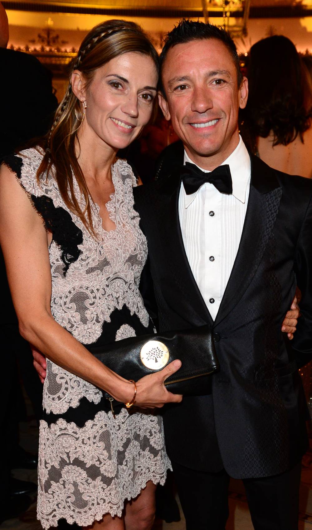 Frankie Dettori smiles alongside his wife Catherine Dettori