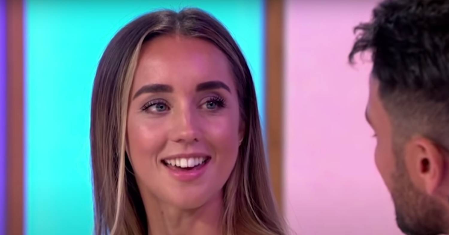 Emily Andre smiles