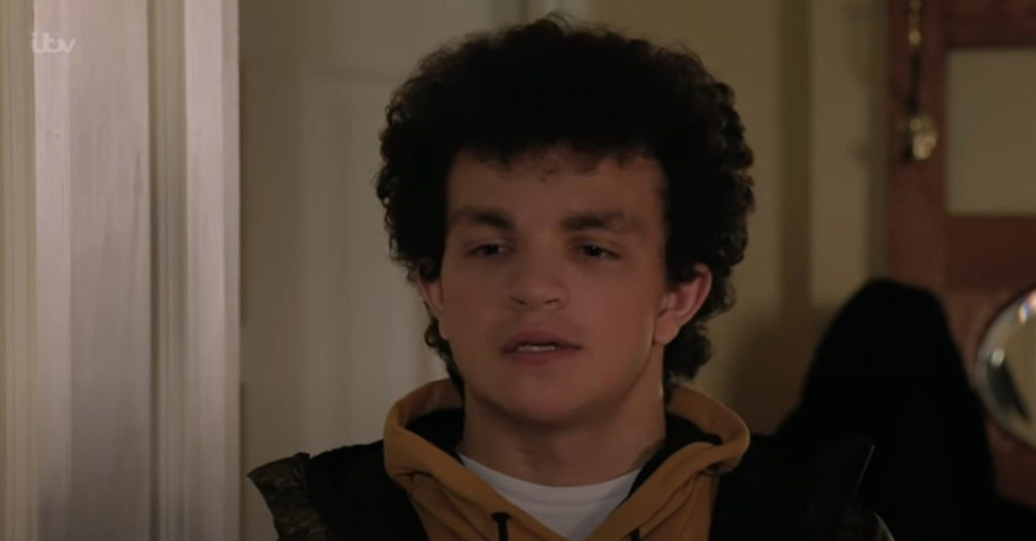 Simon looking moody on Corrie