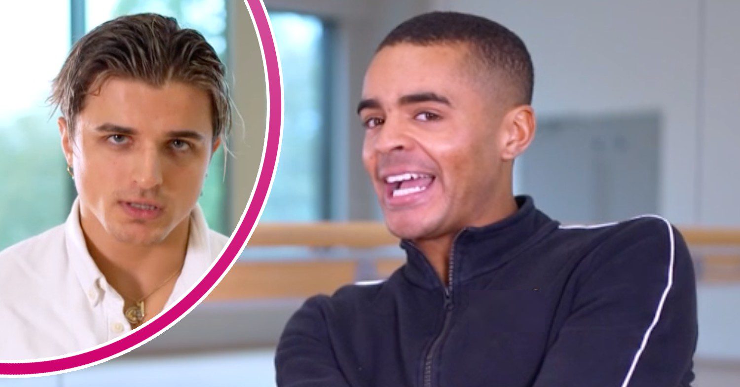 Layton Williams smiles, Nikita Kuzmin looks into the camera