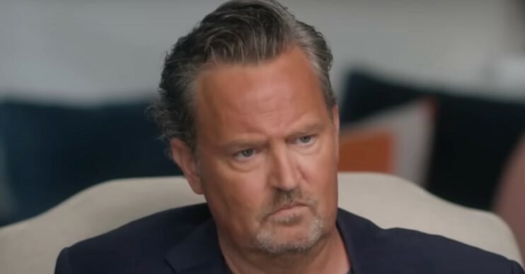 Matthew Perry looking down