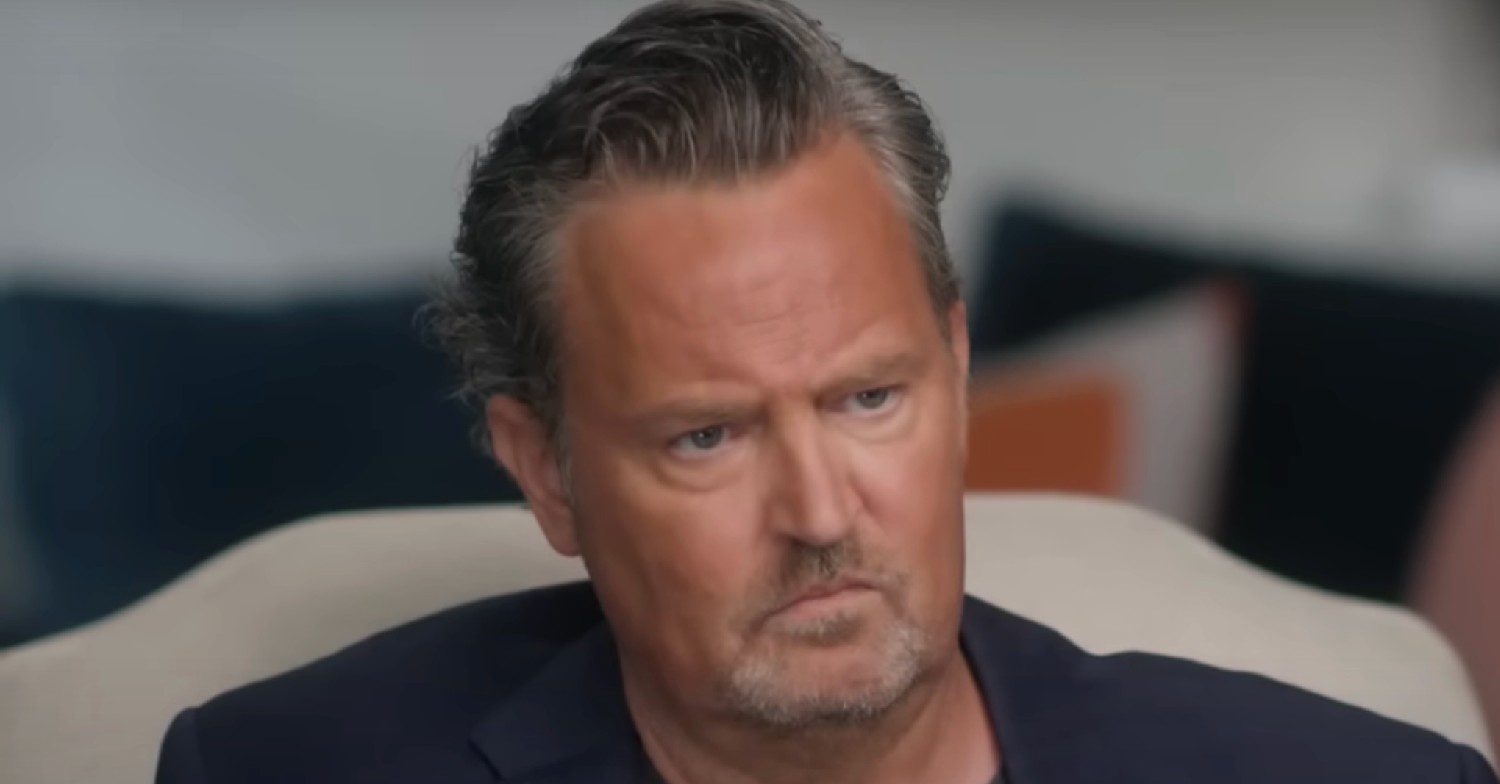 Matthew Perry looking down
