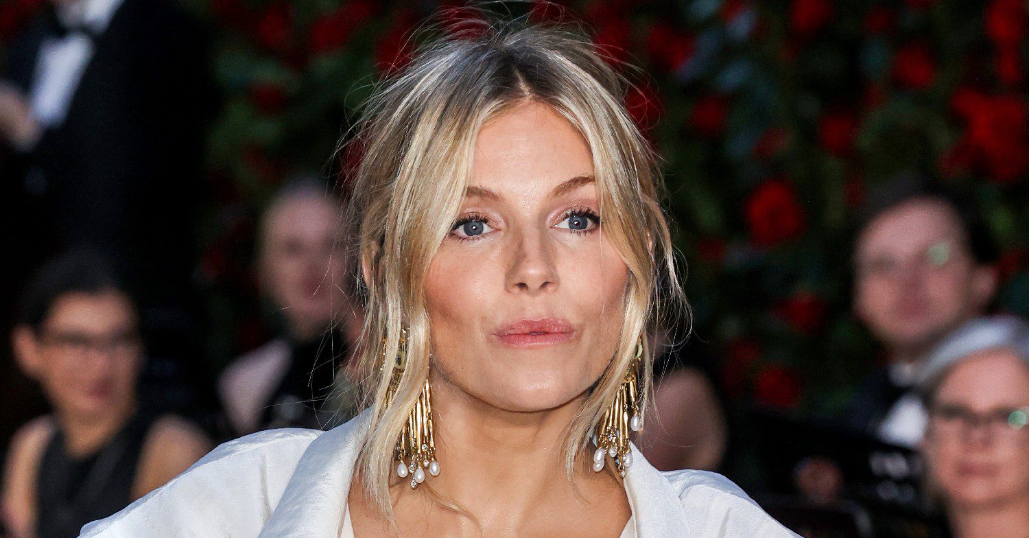 Sienna Miller posing