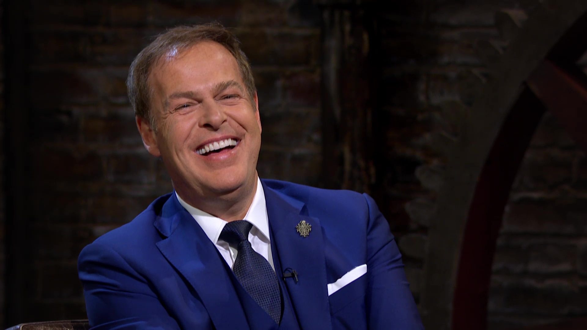 Dragons' Den star Peter Jones laughing on Dragons' Den