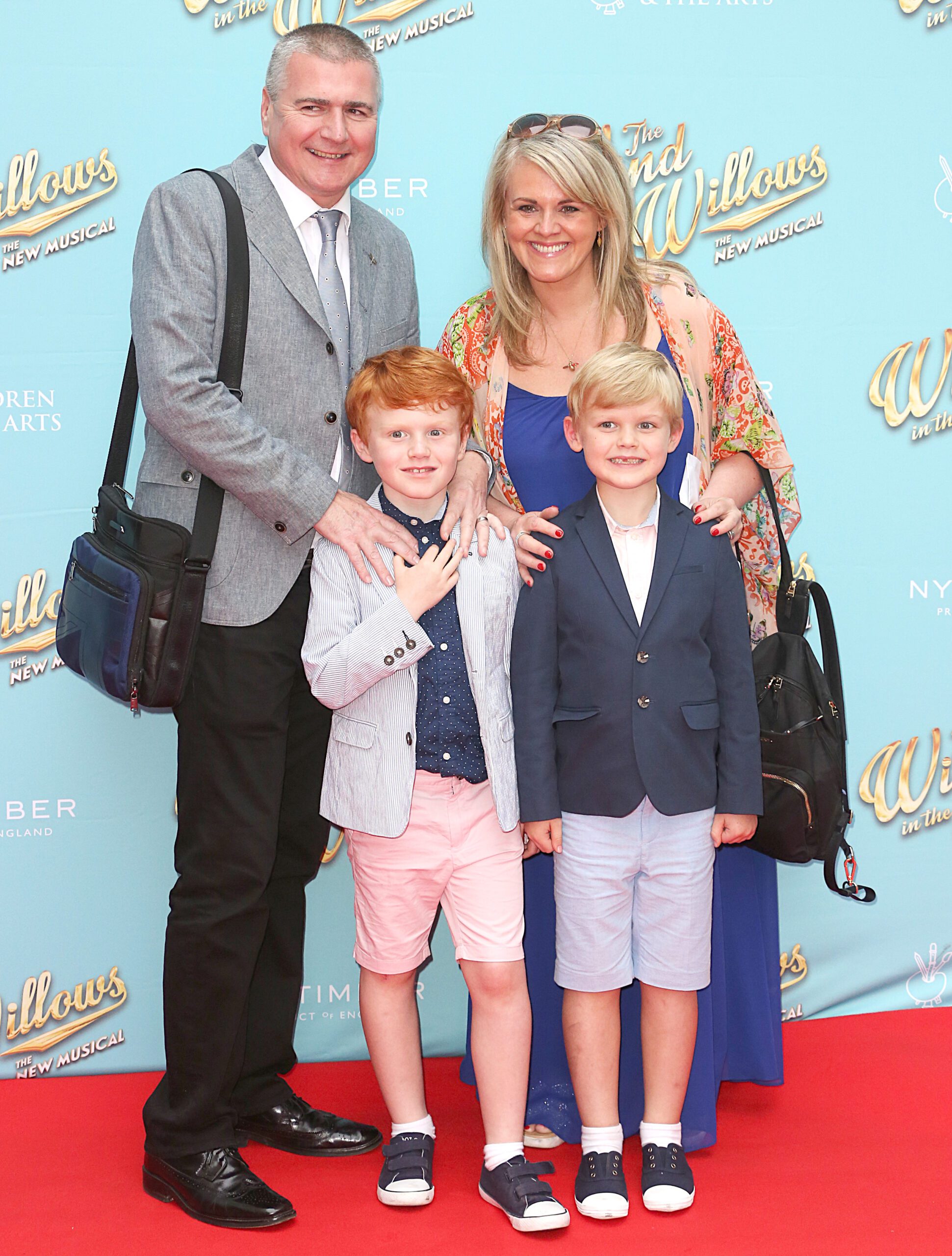 Sally Lindsay and Steve White on the red carpet with their twin sons