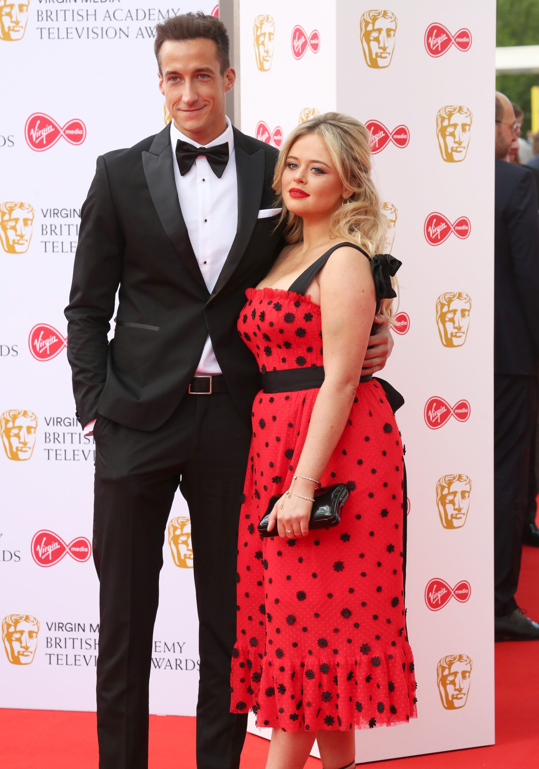 Emily Atack on the red carpet with Rob Jowers