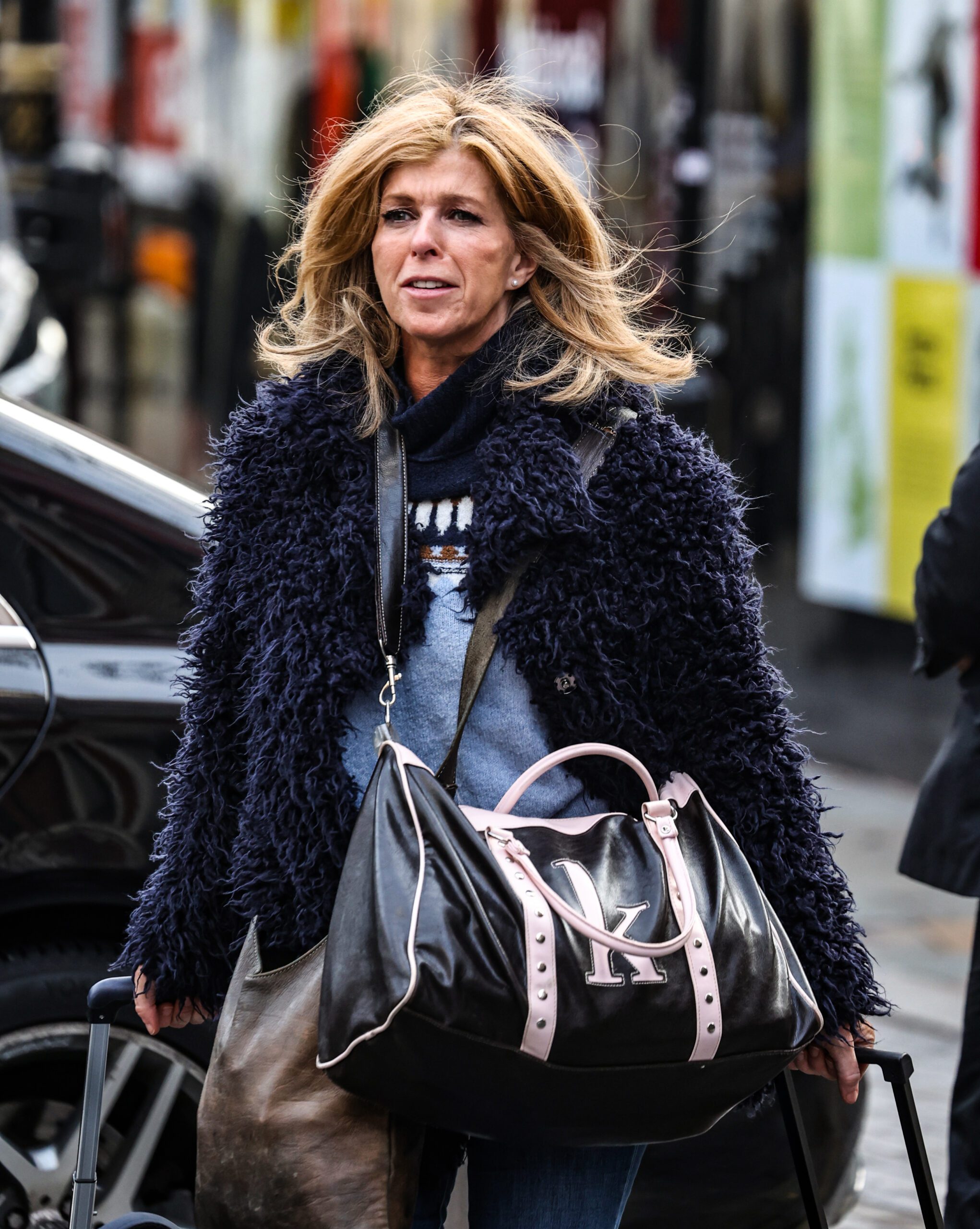 Kate Garraway in a blue fluffy coat