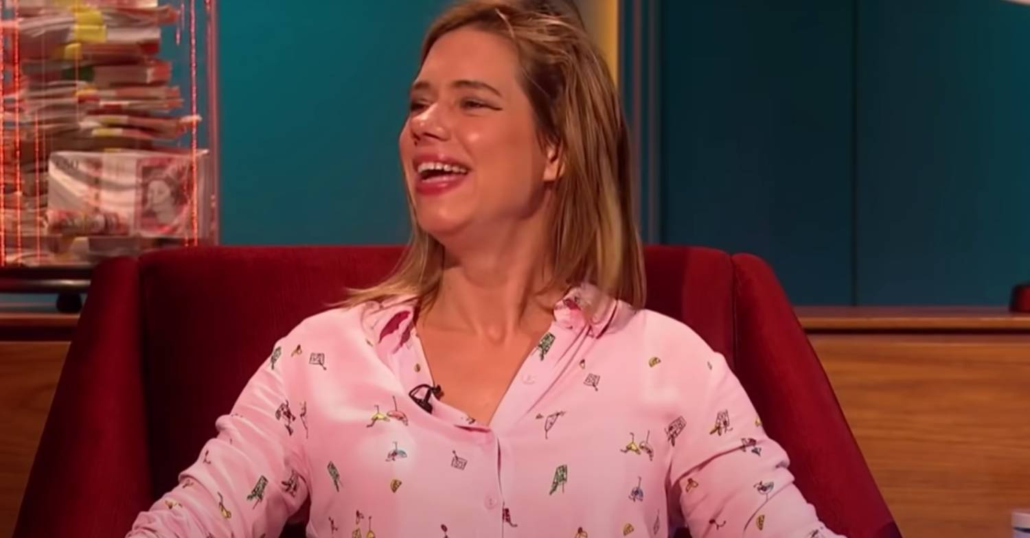 Lou Sanders laughs
