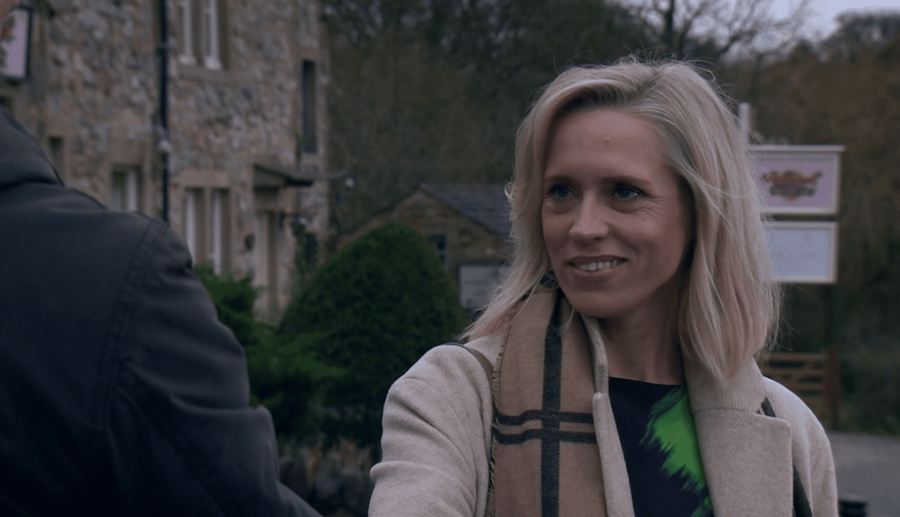 Emmerdale: Ruby Fox-Miligan as played by Beth Cordingly smiles as she shakes Cain's hand