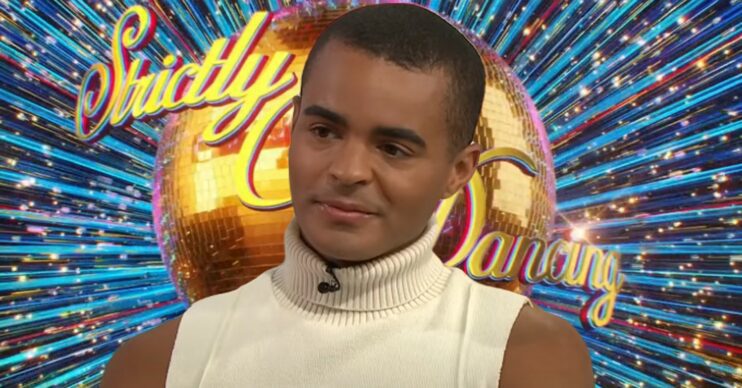 Layton Williams looks serious in front of Strictly logo