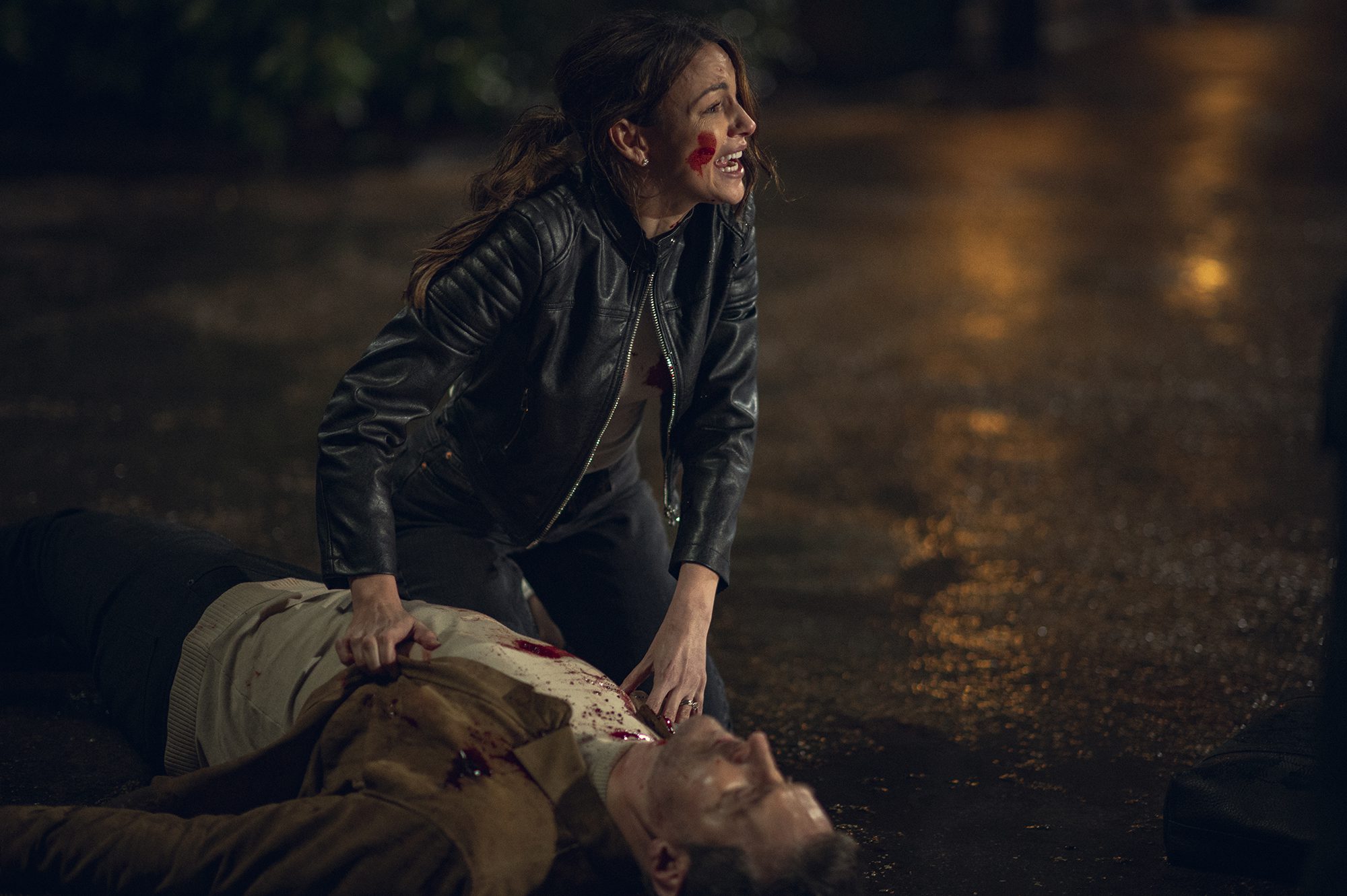 Maya Stern (Michelle Keegan) begs for help after the murder of husband Joe (Richard Armitage)