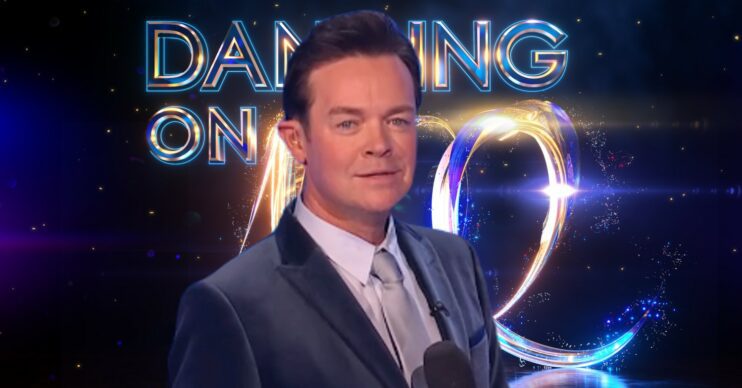 Stephen Mulhern in front of Dancing On Ice logo