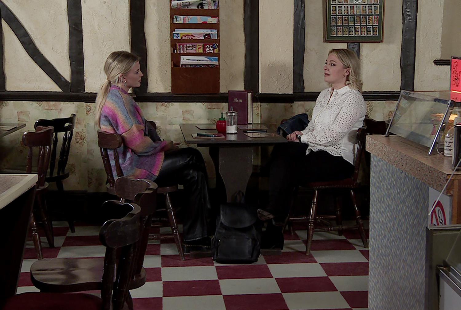 Coronation Street's Bethany and Suki are talking to each other at Roy's