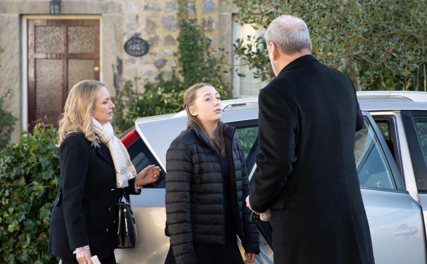 Emmerdale's Nicola, Angelica and Jimmy are outside of the car