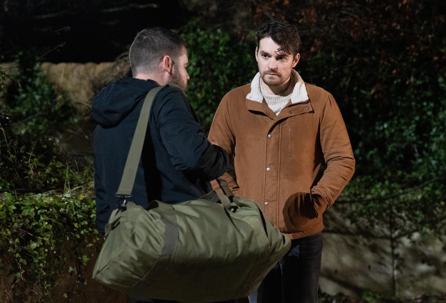 Emmerdale's Aaron and Mack are talking outside