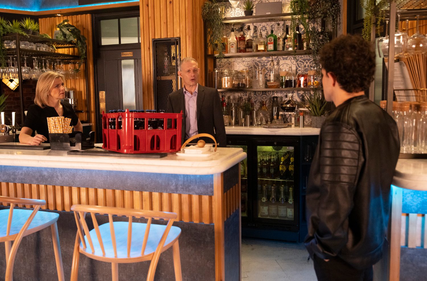 Coronation Street's Nick and Leanne are talking to Simon in the Bistro