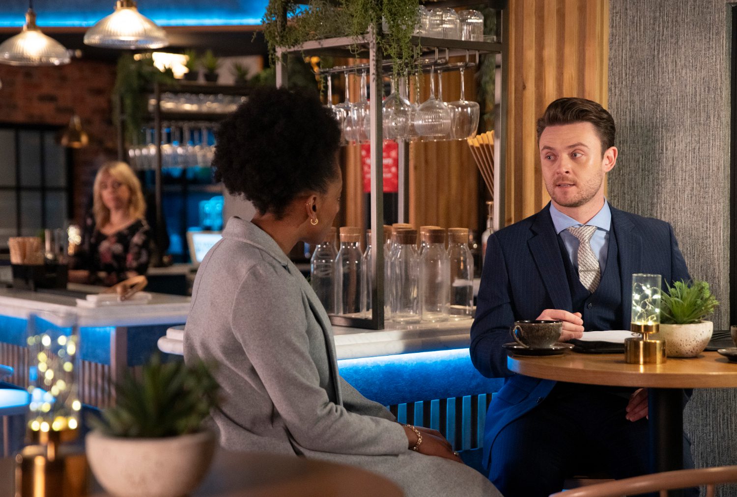 Coronation Street's Joel is talking to Emily in the Bistro