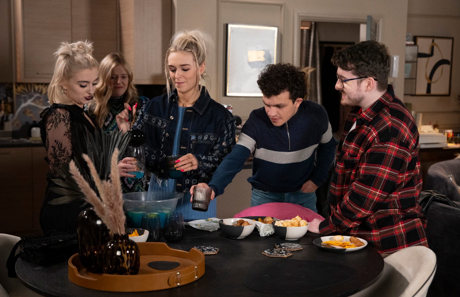 Nina, Lauren, Simon and Bobby drink punch at the party in Corrie