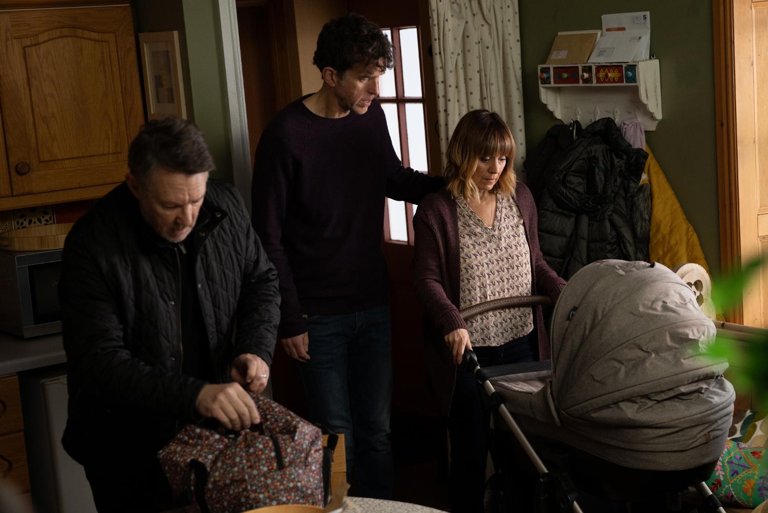 Rhona Goskirk is comforted by Marlon Dingle as she looks at baby Ivy and Gus packs up her stuff