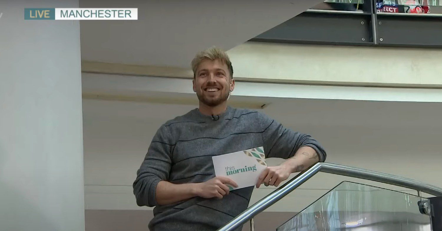 Sam Thompson on an escalator on This Morning