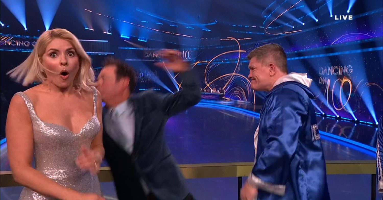 Stephen Mulhern being punched by Ricky Hatton on Dancing On Ice. Holly looks shocked