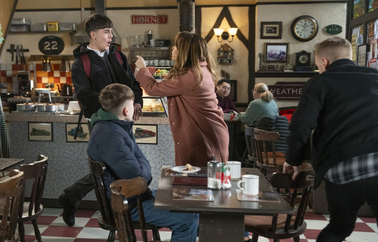 Maria is lunging towards Mason at Roy's
