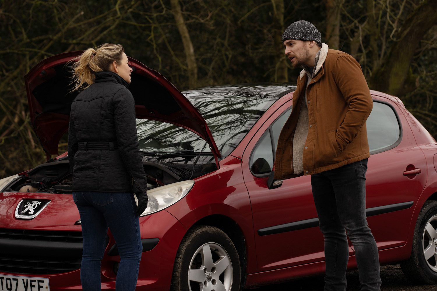 Emmerdale's Charity and Mack are talking together outside of a broken down car