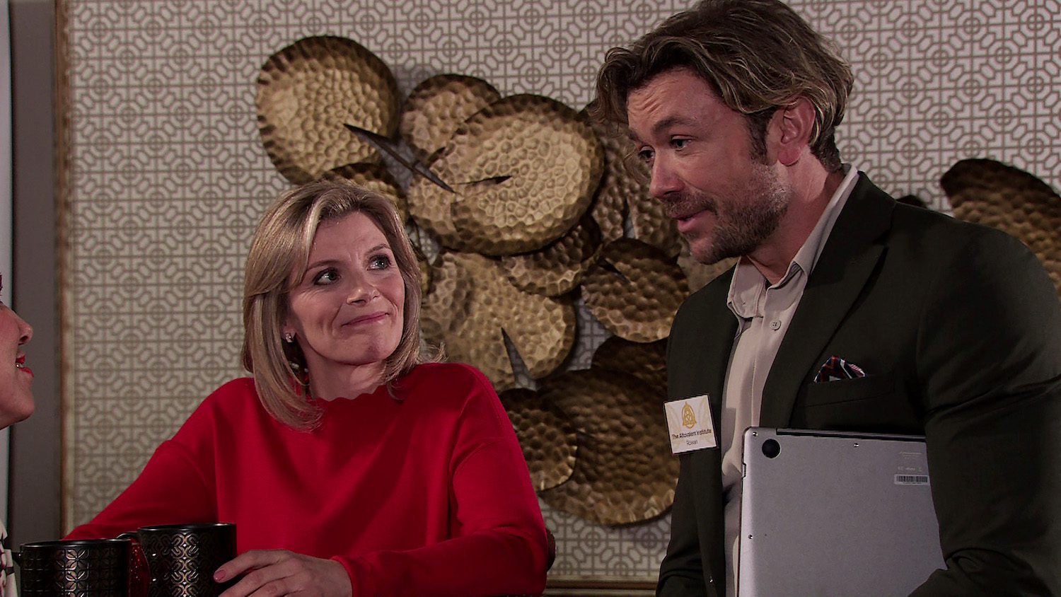 Leanne smiles at Rowan in Coronation Street