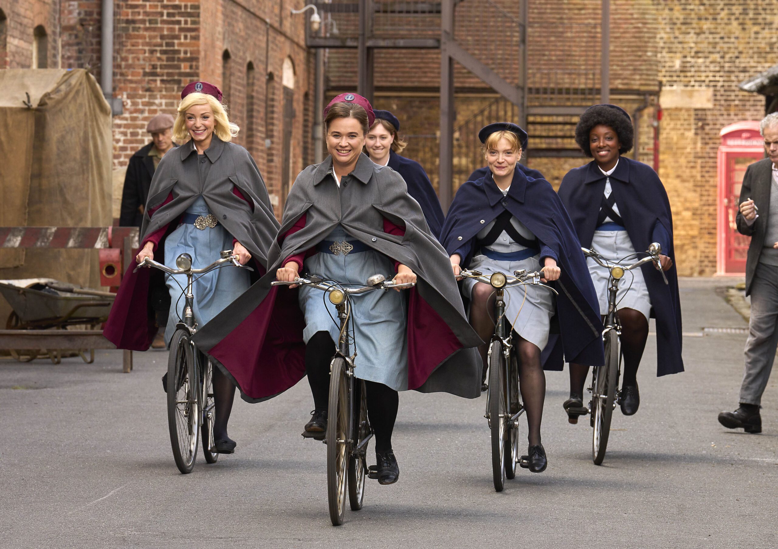 The cast of Call The Midwife series 13 on bicycles riding to work