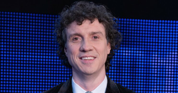 Darragh Dennis smiling in promo pic for The Chase